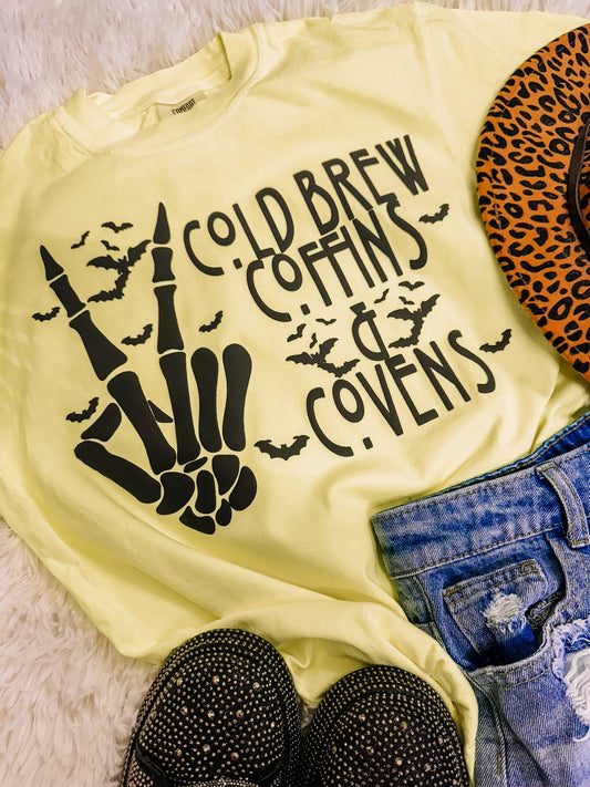 Cold Brew, Coffins, & Covens Puff Print Halloween Comfort Colors Graphic Tee